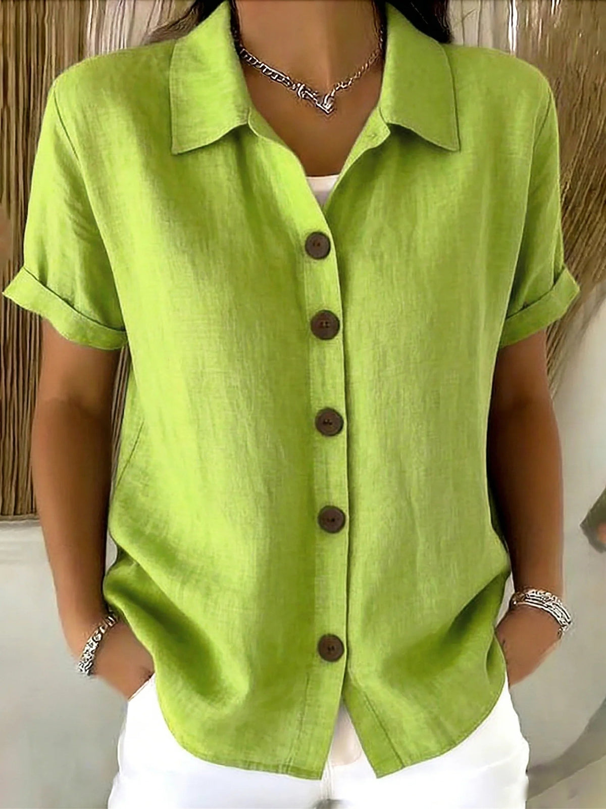 Green short-sleeve button-up linen-cotton shirt with pointed collar and front buttons