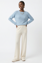 Women’s wide-leg knit pants in cream, pull-on style with wide, flowing legs