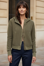 Olive waffle-knit hoodie with hood, snap-front placket, and kangaroo pocket.