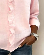 Pink ruffle-trim V-neck blouse with long sleeves