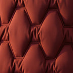 Rose red quilted hooded coat fabric detail, stitched diamond panels