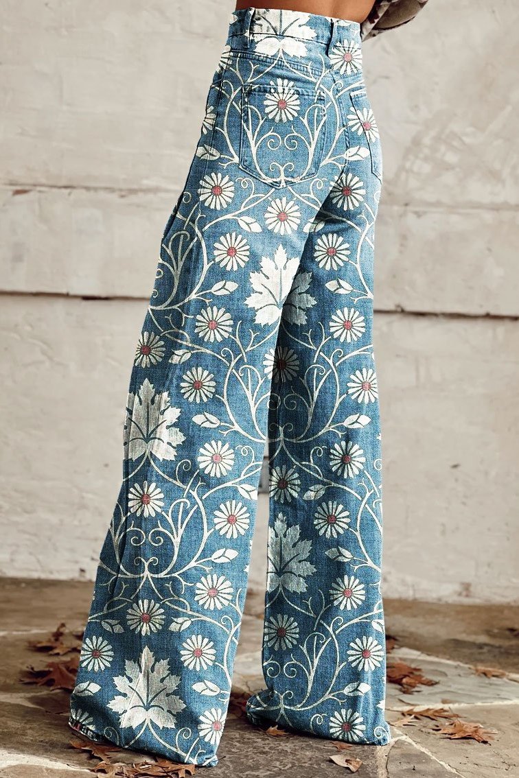 Boho wide-leg pants in blue with white floral print and stitched seams, side view