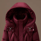 Rose red quilted hooded coat showing hood lining and snap cuffs on sleeves