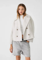 Off-white boxy cropped double-breasted blazer with notched lapels and button front