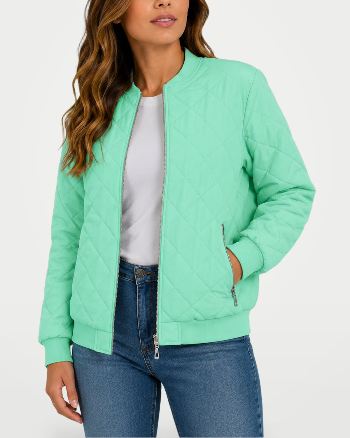 Women’s quilted bomber jacket in light green, front zipper, diamond stitch pattern.
