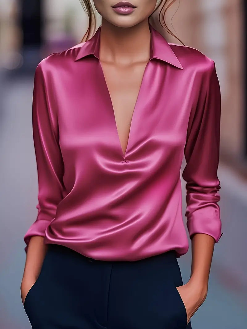Raspberry pink V-neck satin blouse with pointed collar and long sleeves