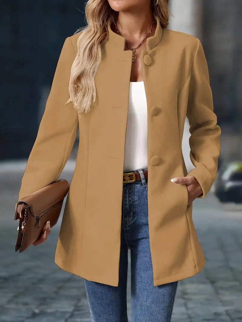 Camel mid-length winter coat with buttoned stand collar, front pockets, and long sleeves