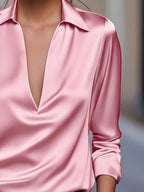 Light pink V-neck satin blouse with long sleeves and pointed collar