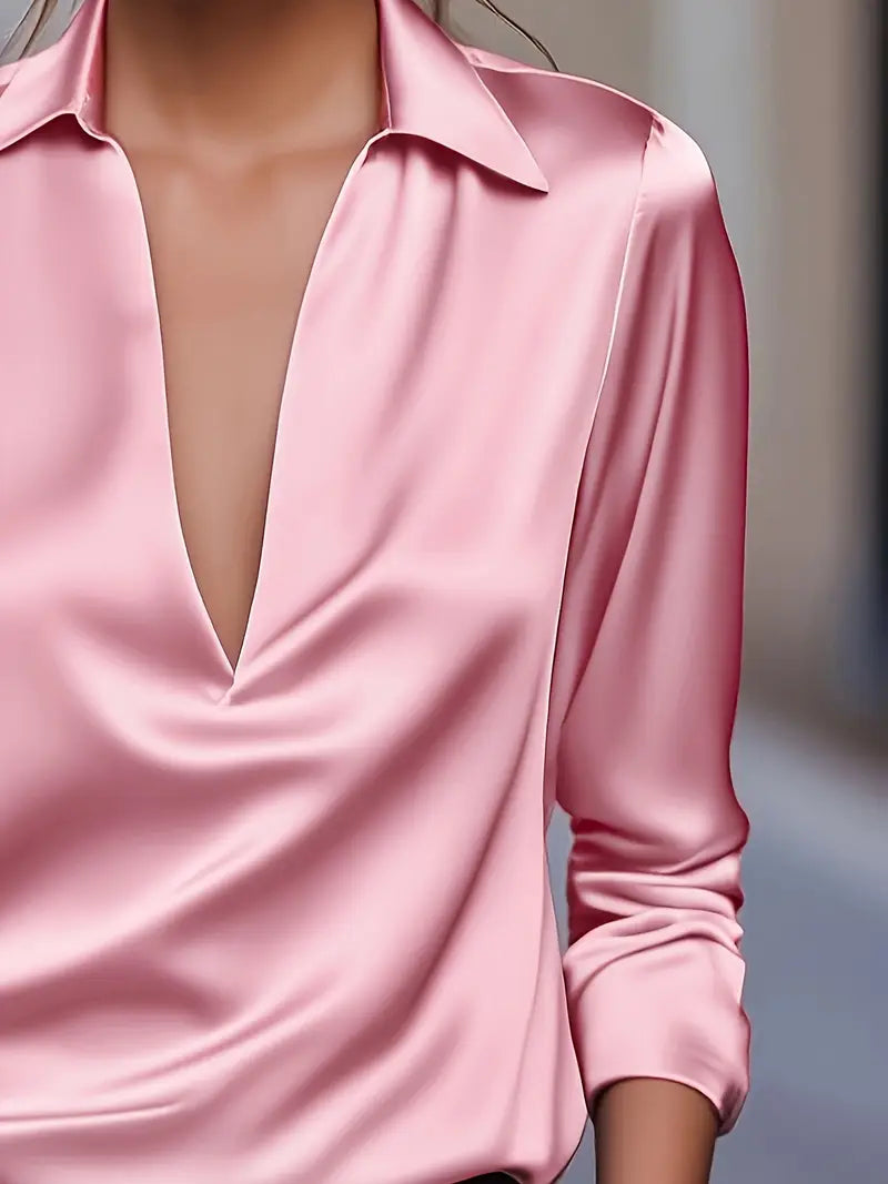 Light pink V-neck satin blouse with long sleeves and pointed collar