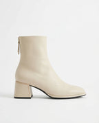 Ivory women's square-toe ankle boot with side zip and chunky block heel