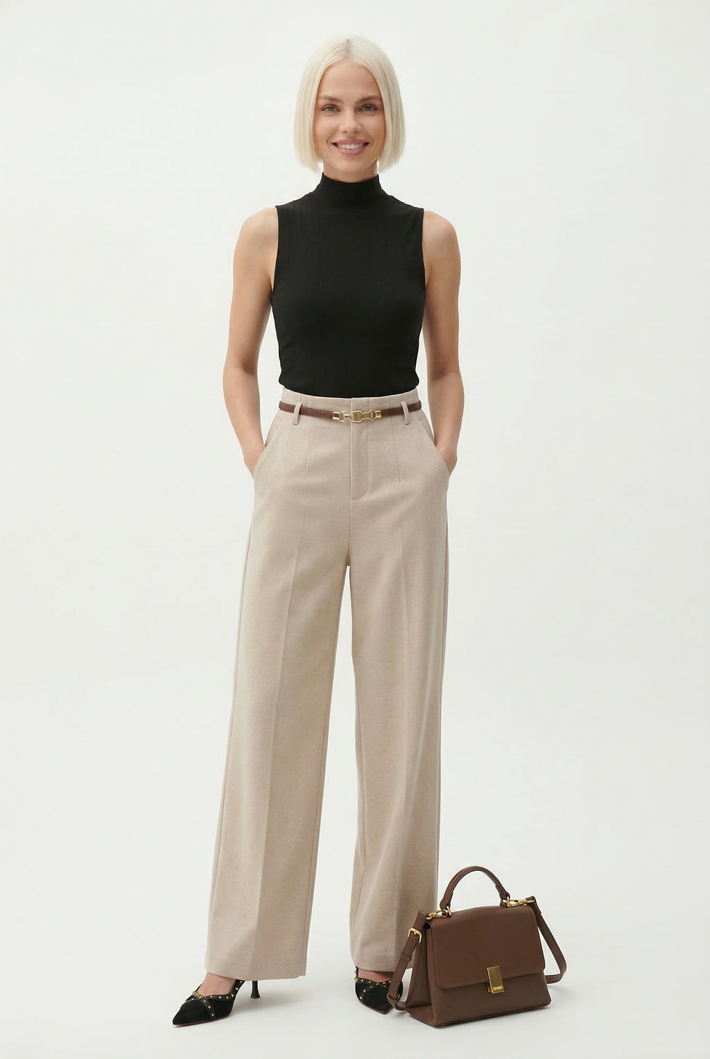 Light beige high-waisted wide-leg trousers with belt and wide, flowing legs