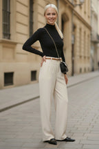 White high-waisted wide-leg wool blend trousers with belt at waist
