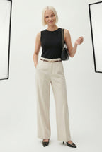 Cream high-waisted wide-leg trousers with belt and straight, relaxed legs