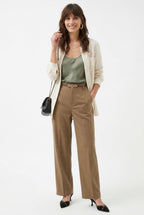 Beige high-waisted wide-leg trousers with belt, featuring a clean front crease