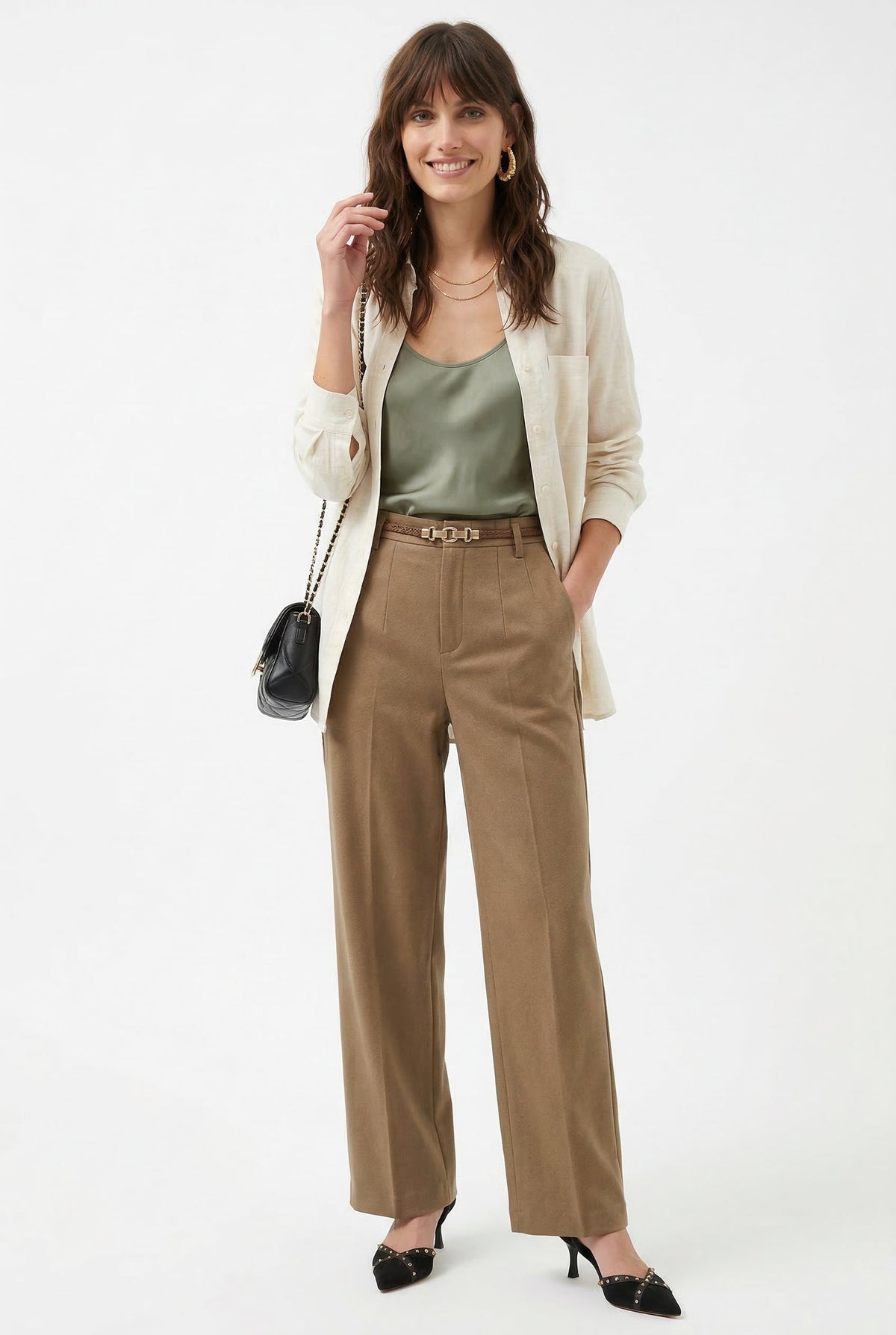 Beige high-waisted wide-leg trousers with belt, featuring a clean front crease