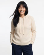 Women's knit hoodie in cream with drawstring hood and front pocket