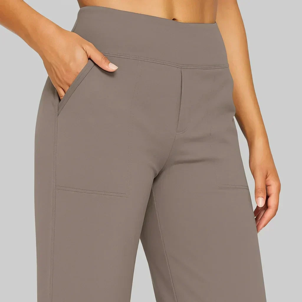 Taupe high-waisted yoga pants close-up of waistband and front seam details
