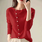 Red knit sweater with V-neck, front buttons, and ribbed cuffs