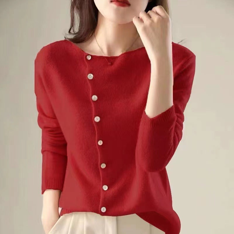 Red knit sweater with V-neck, front buttons, and ribbed cuffs