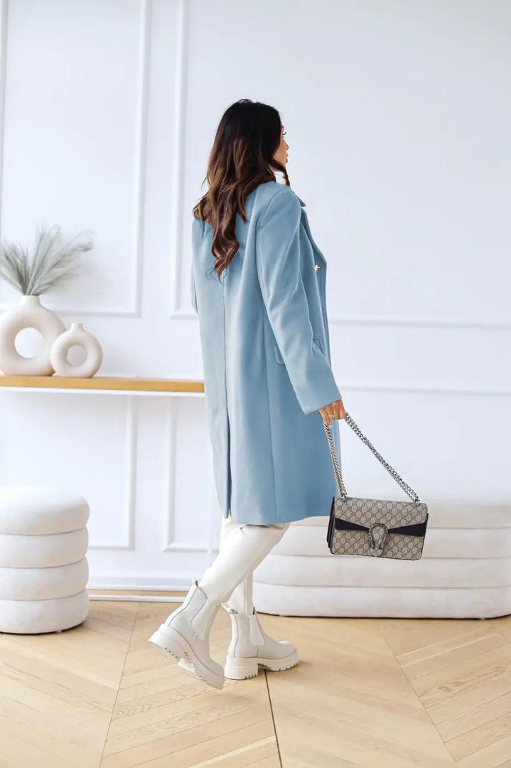 Light blue double-breasted wool coat from back view, long sleeves, tailored shape