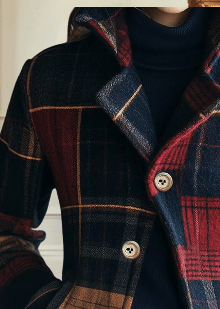 Plaid wool jacket close-up with cream-lined seams and button front