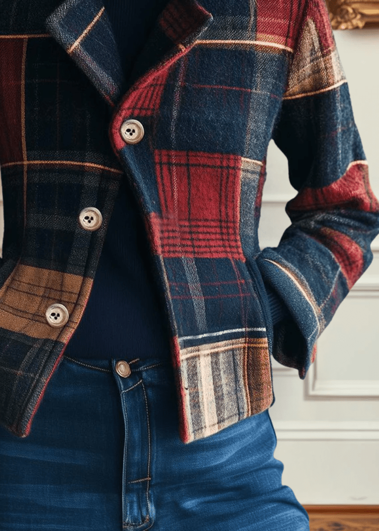 Plaid wool jacket detail with button cuffs and panel plaid over blue jeans