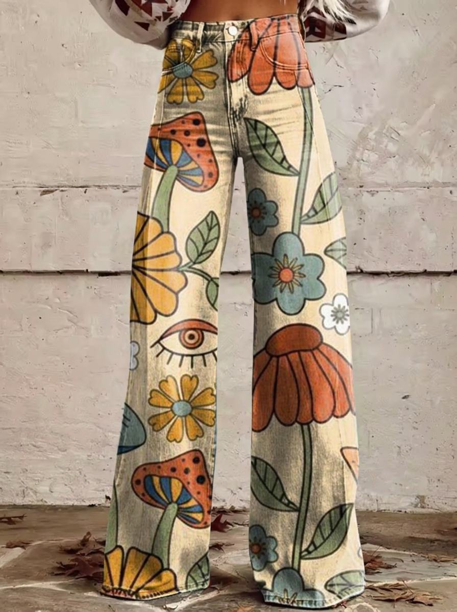 Retro floral wide-leg jeans in cream with multicolor flower and leaf print.