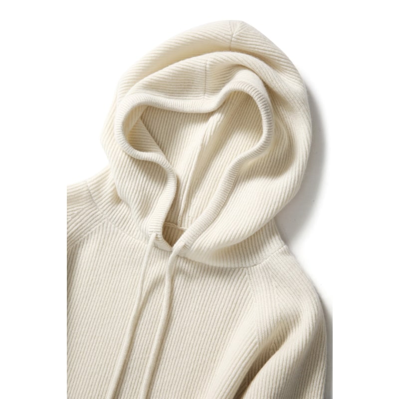 Women’s white pullover hoodie close-up with drawstring hood and kangaroo pocket