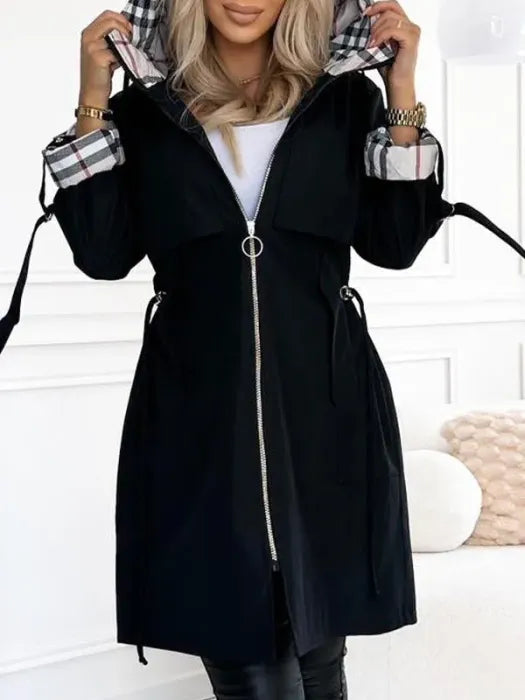 Women's black zip waterproof coat with hood, plaid lining, and front zipper closure