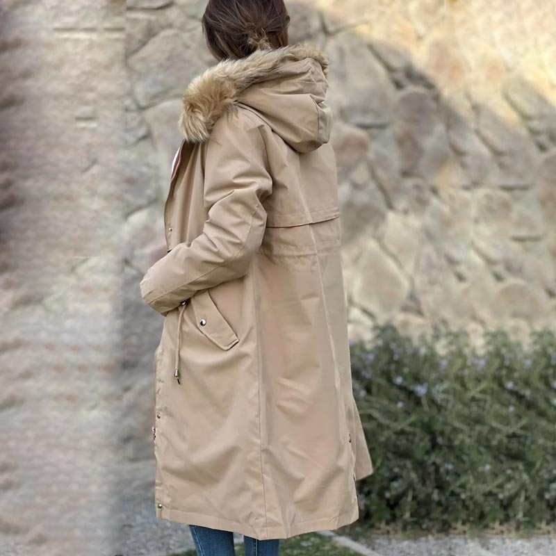 Beige waterproof women's parka jacket with fur-lined hood and side pockets