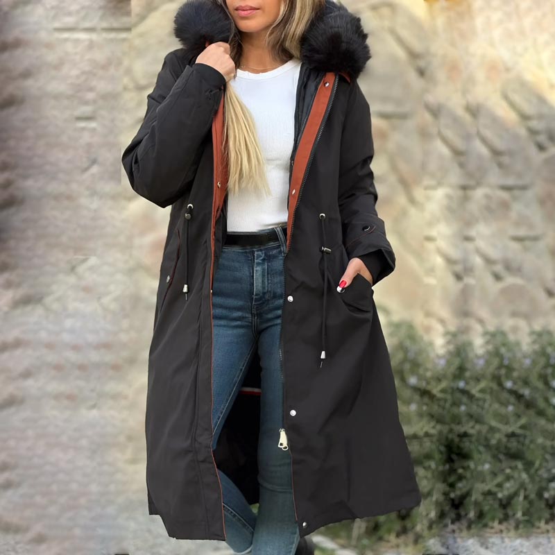 Black waterproof women's parka jacket with faux fur hood and two front flap pockets