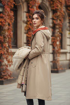 Beige waterproof women's parka jacket with fur-lined hood, drawstring waist, button placket