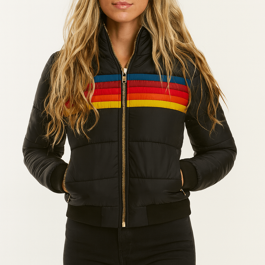 Oumani Stella waterproof rain jacket in black with red, yellow, and blue stripe zip front
