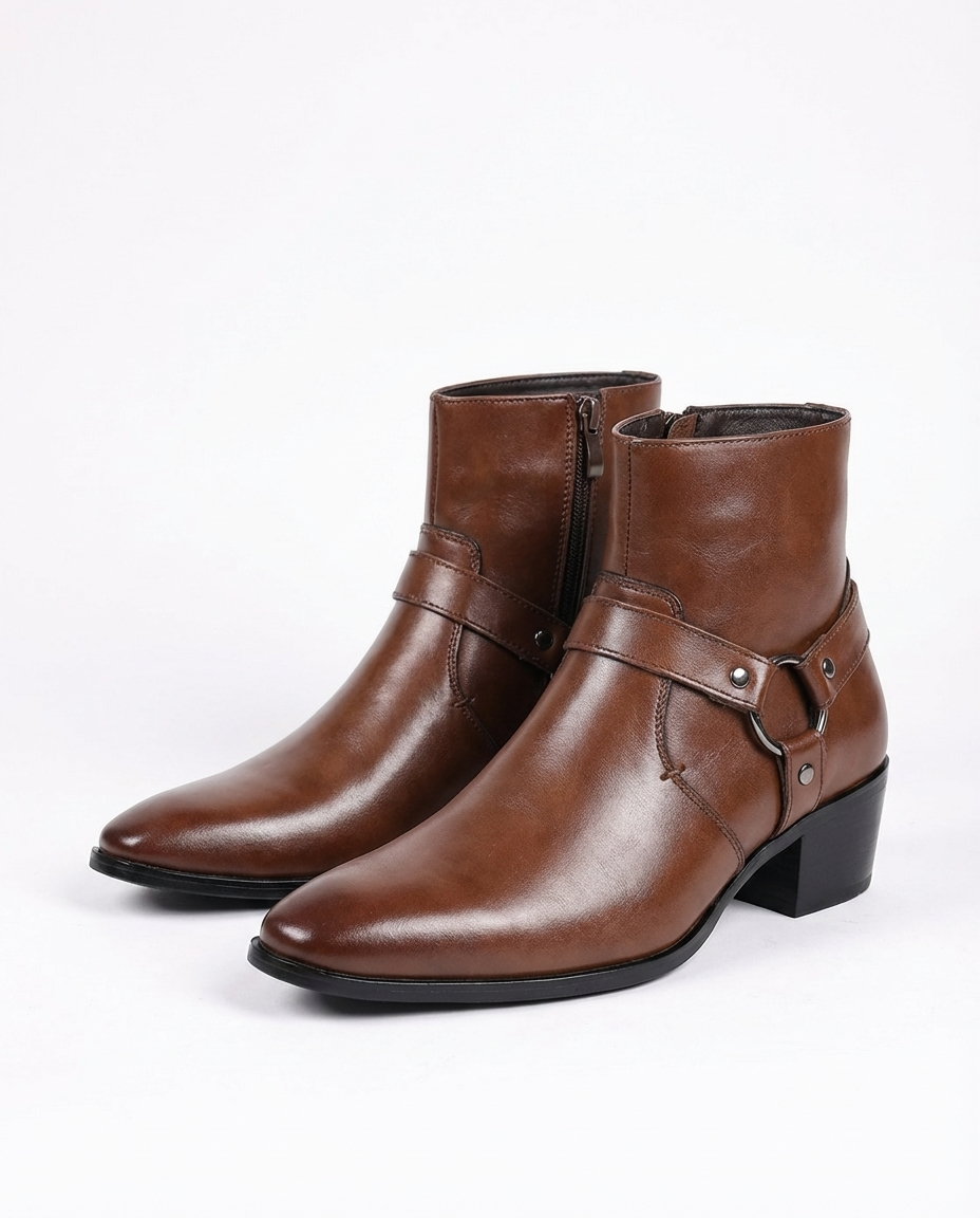 Brown leather ankle boots with side zipper, buckle strap, and block heel.