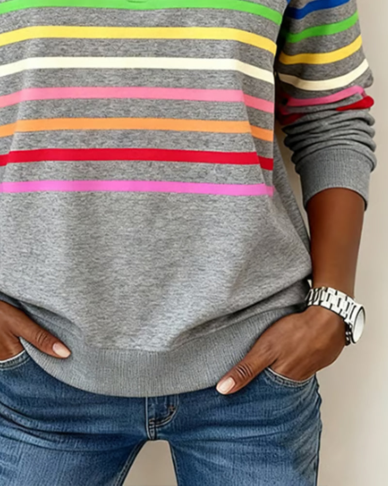 Women’s heather gray knit quarter-zip pullover with multicolor horizontal striped bands on front.