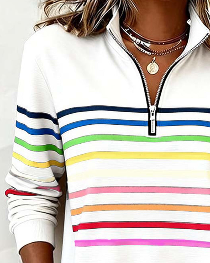 Women’s white knit quarter-zip pullover with multicolor striped bands and ribbed sleeve cuffs.