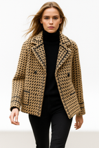 Camel and black houndstooth knit jacket with notched lapels and button closure.