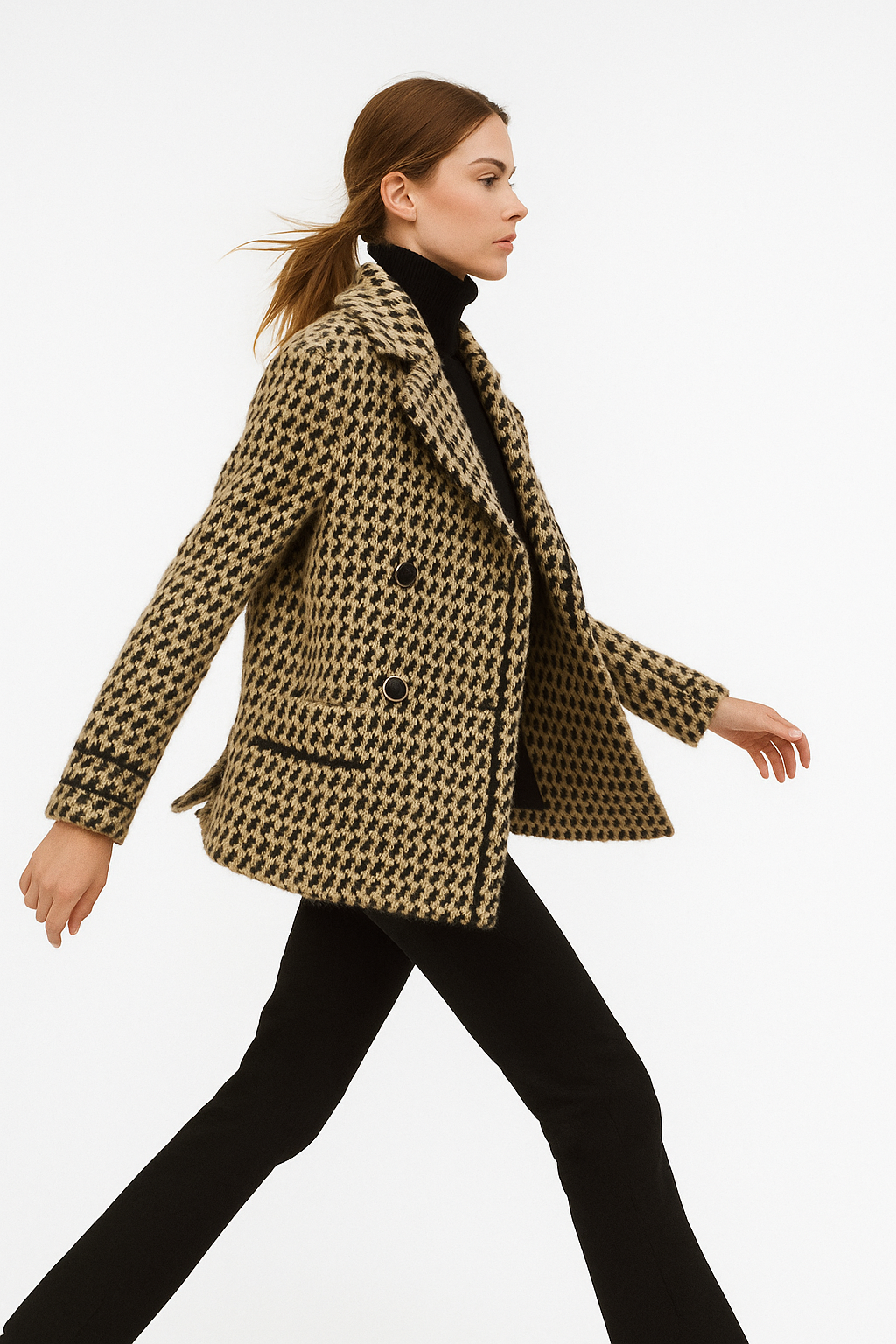 Camel and black houndstooth knit jacket with flap pockets and button front.