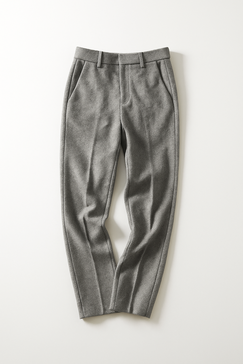 Gray high-waisted wide-leg trousers, flat lay, with belt loops and front pleats