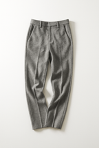 Gray high-waisted wide-leg trousers, flat lay, with belt loops and front pleats